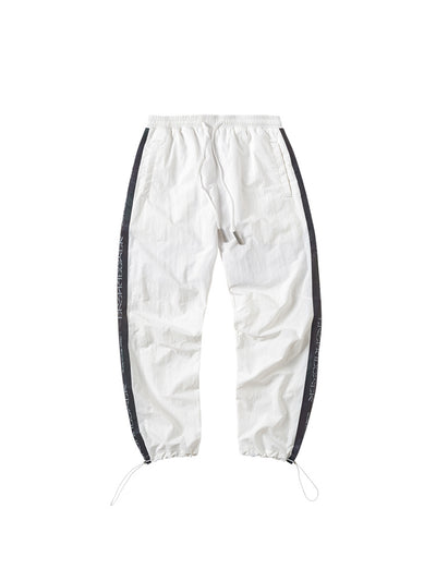 Pantalones Deportivos Reflectantes con Cordón - Diseño Suelto y Moderno - Image 11