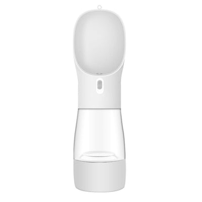 Pink portable pet water bottle with integrated feeder bowl, clear reservoir, and dispensing button for dogs. - Image 34