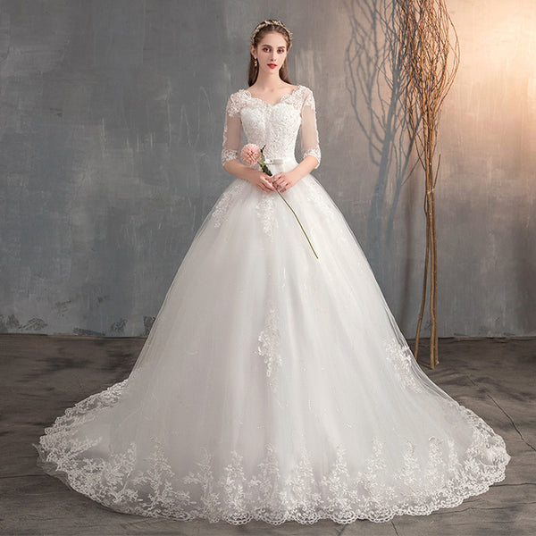 Vestido de Novia con Escote en V, Encaje y Manga Larga - Image 7