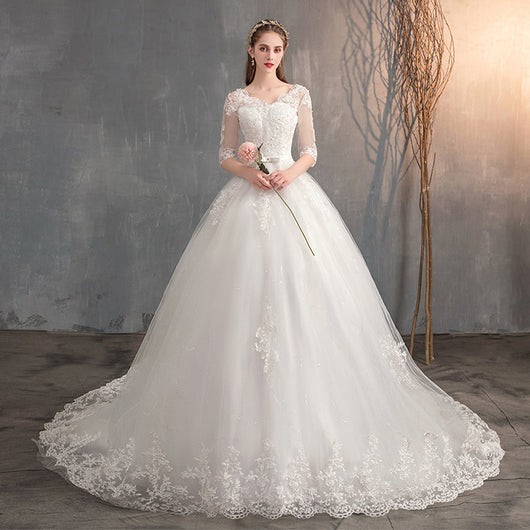 Vestido de Novia con Escote en V, Encaje y Manga Larga - Image 7