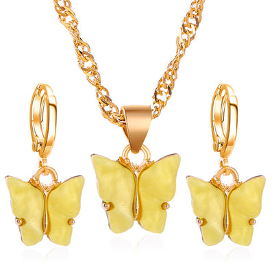 Pink acrylic butterfly necklace and earring set with gold-colored chain and hoop earrings. - Image 8