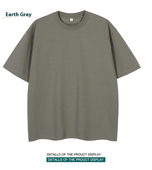 Moss green short-sleeve cotton t-shirt with a crew neck and a relaxed, oversized fit. - Image 14