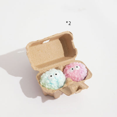 Assortment of soft, colorful yarn ball dog toys with built-in bells, featuring various patterns and textures. - Image 2