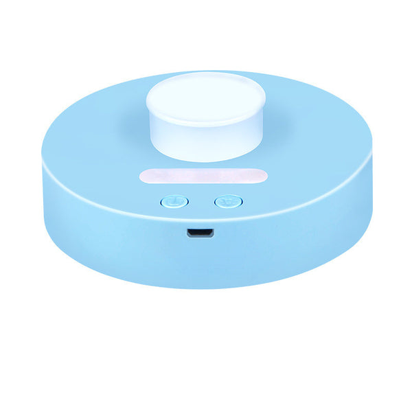 White round portable USB humidifier with a night light, single fog outlet, and two control buttons. - Image 7