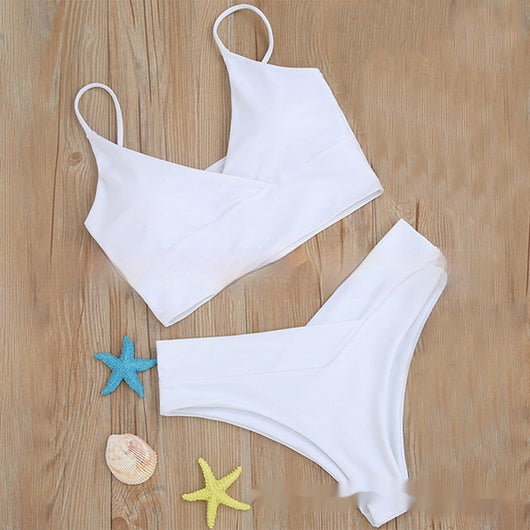 Bright yellow two-piece bikini swimsuit with a crop top and high-cut V-front bottoms, laid flat. - Image 17