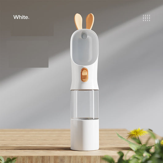 Grey and white portable pet water bottle with clear reservoir, built-in drinking bowl, and decorative bunny ears. - Image 11