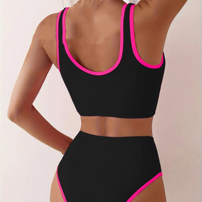 Women's backless two-piece swimsuit with a black, white, and hot pink color block design. Features a sporty top and high-waisted bottoms. - Image 2