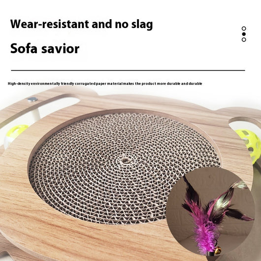 Multi-level cat scratcher with a round corrugated cardboard surface, a wooden track with a green ball, and a pink feather wand with a bell. - Image 2