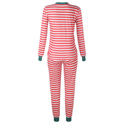 Family of four wearing matching red and white striped Christmas pajamas with green cuffs. One child wears a Santa hat, another wears reindeer antlers. - Image 17