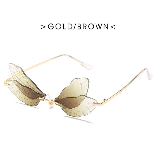 Dragonfly wing sunglasses with gold metal frames and unique brown tinted rimless lenses, suitable for adults. - Image 4