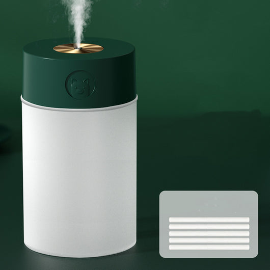 White cylindrical humidifier with a gold nozzle emitting mist, featuring a subtle bear emblem. Includes five aromatherapy oil bottles. - Image 11