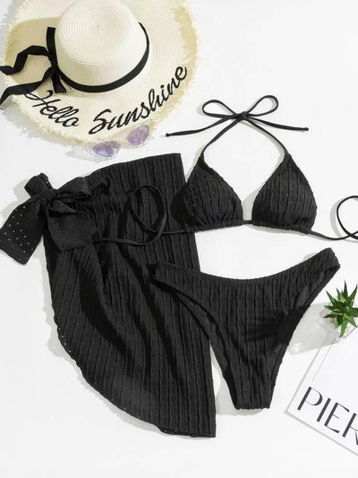 White textured bikini with ruched triangle top, high-cut bottom, and matching sarong with a large bow. - Image 8
