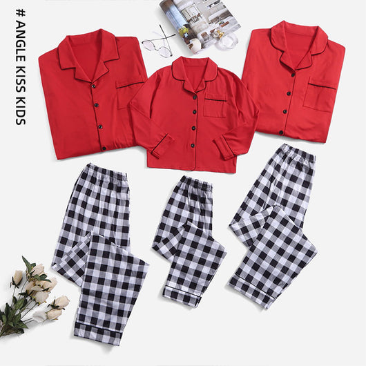 Three dark blue family pajama sets with white and light blue snowflake patterns, featuring long-sleeve tops and pants. - Image 16