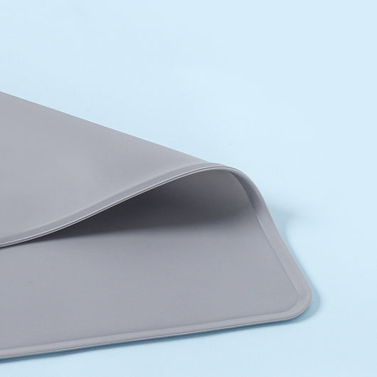 Blue rectangular silicone pet placemat with a raised edge and a small paw print detail in the corner. - Image 8