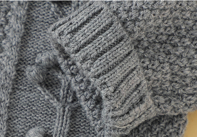 Romper Tejido a Mano en Lana Merino con Diseño de Burbujas Triangulares - Image 13