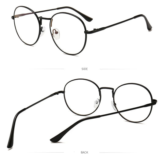 Black round anti-blue light glasses with clear lenses showing a blue reflection, resting on a gray textured surface. - Image 10