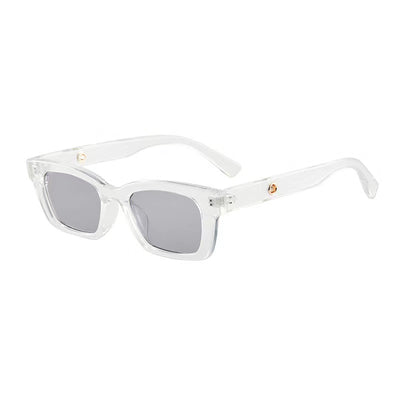 Transparent gray frame sunglasses with dark gray rectangular lenses and small gold accents on the temples. - Image 9