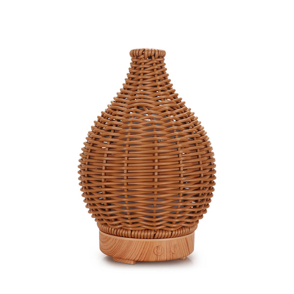 Mini ultrasonic aroma diffuser with a brown hollow rattan-style body and a white base, featuring control buttons. - Image 2