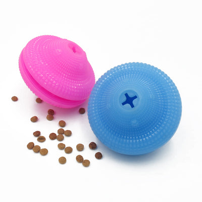 Blue TPR pet toy ball with textured surface, designed for food dispensing and molar training, with kibble scattered around. - Image 3