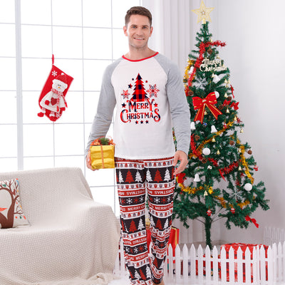 Family of four wearing matching Christmas pajamas with 'MERRY Christmas' text, leopard print, and plaid trees. - Image 5