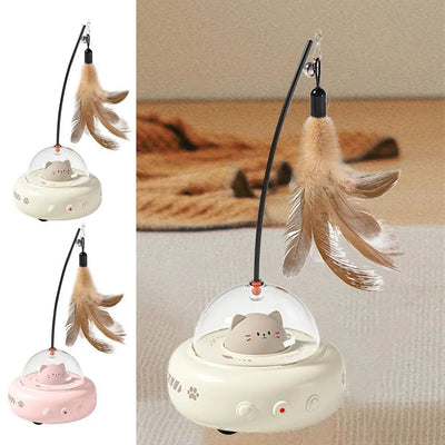 Electric interactive cat toy with a beige base, clear dome, and a cute cat head inside. Features a feather teaser wand with a bell. - Image 10