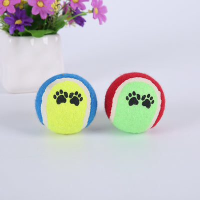 Red and green pet tennis ball with black paw print graphics, a durable rubber dog toy for fetch. - Image 8