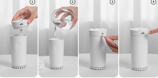 Gray cylindrical USB aromatherapy humidifier with a silver band and car icon on top, designed for car use. - Image 17