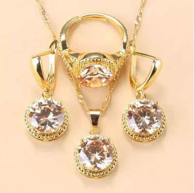 Juego de Joyería Tres Piezas con Zirconia Redonda - Anillo, Collar y Aretes - Image 11