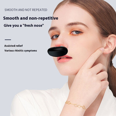 Black intelligent infrared nasal relief device with two translucent nasal probes, shown at an angle. - Image 2