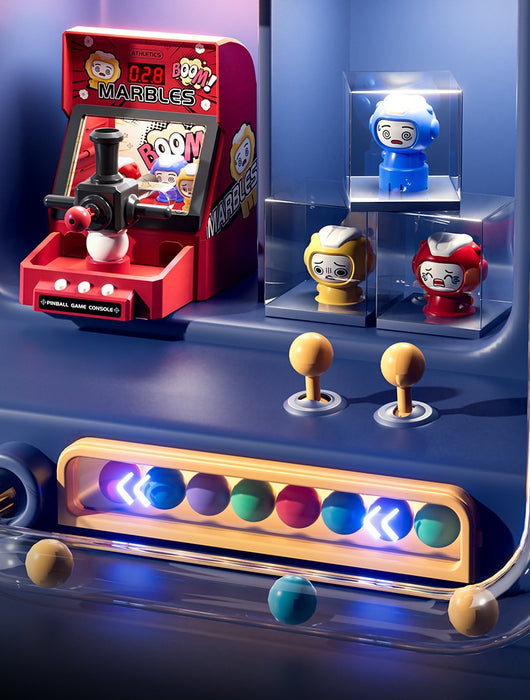 Red tabletop marble game machine with a joystick, buttons, and a lighted display, featuring colorful marbles. - Image 10