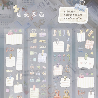 Die-cut PET tape stickers featuring pastel hand-drawn stationery like binder clips, paper clips, notepads, and clothespins.