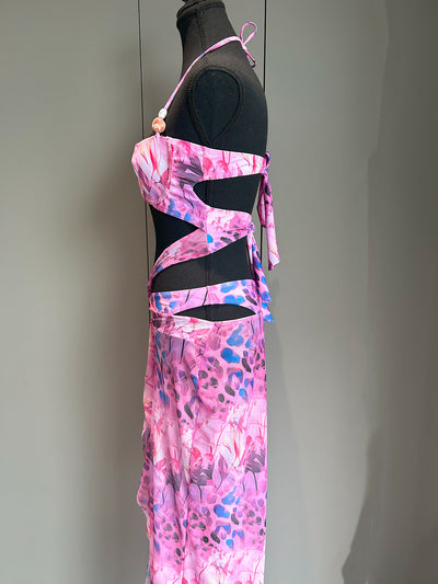 Women's two-piece swimsuit with a halter bikini top and a matching long skirt, featuring a vibrant tropical and animal print. - Image 13