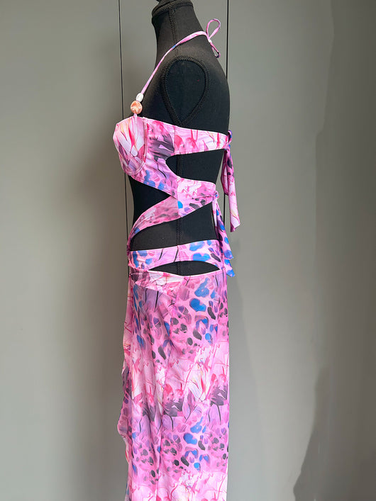 Women's two-piece swimsuit with a halter bikini top and a matching long skirt, featuring a vibrant tropical and animal print. - Image 13