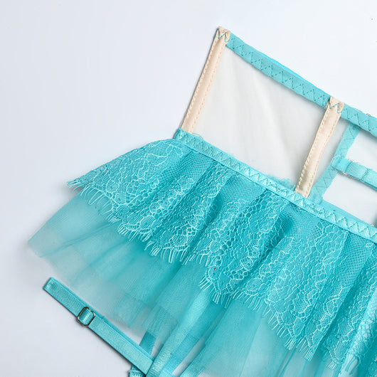 Mint green mesh and lace lingerie set with underwire bra, ruffled garter belt, and thong, displayed flat. - Image 15