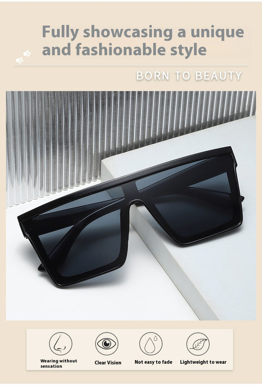 Fashion one-piece large rim sunglasses with a transparent champagne frame and brown gradient lenses. - Image 29