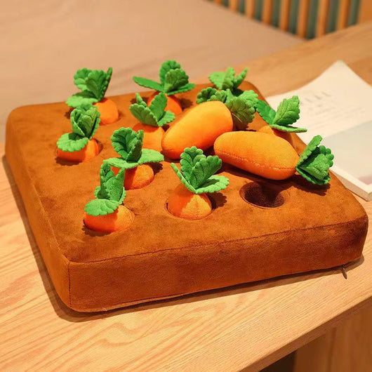Brown plush snuffle mat with ten orange carrot-shaped toys, each with green leafy tops, for pet foraging and play. - Image 3