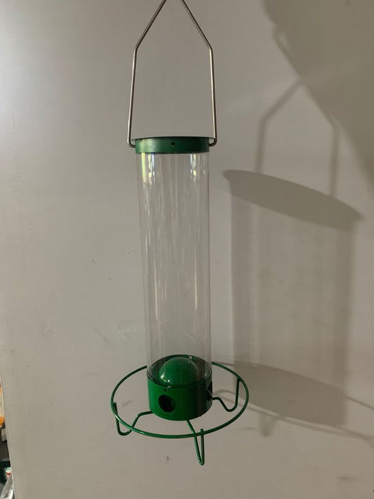 Green and clear tube hanging bird feeder with a metal wire hanger, designed for attracting hummingbirds. - Image 5