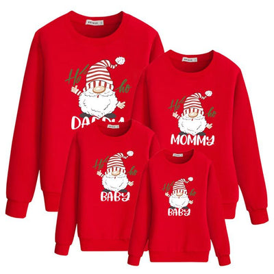 Family matching white long-sleeve crew neck tops with a cute snowman face print, featuring black eyes, an orange carrot nose, and a dotted smile. One adult top - Image 2