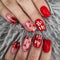 Uñas Postizas Navideñas con Brillo Rojo y Detalles de Amor
