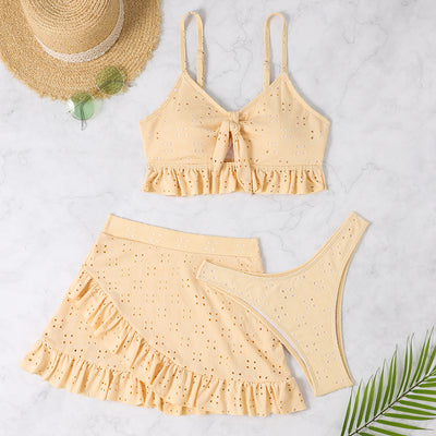 Light blue eyelet two-piece swimsuit set with a tie-front crop top and a matching ruffle-trim hip-hugging skirt. - Image 10