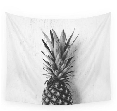 Black and white tapestry featuring a large, detailed print of a pineapple, suitable for modern home decor.