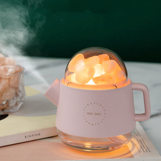 Pink kettle-shaped mini USB humidifier with a clear dome top filled with pink salt crystals, emitting mist. - Image 2