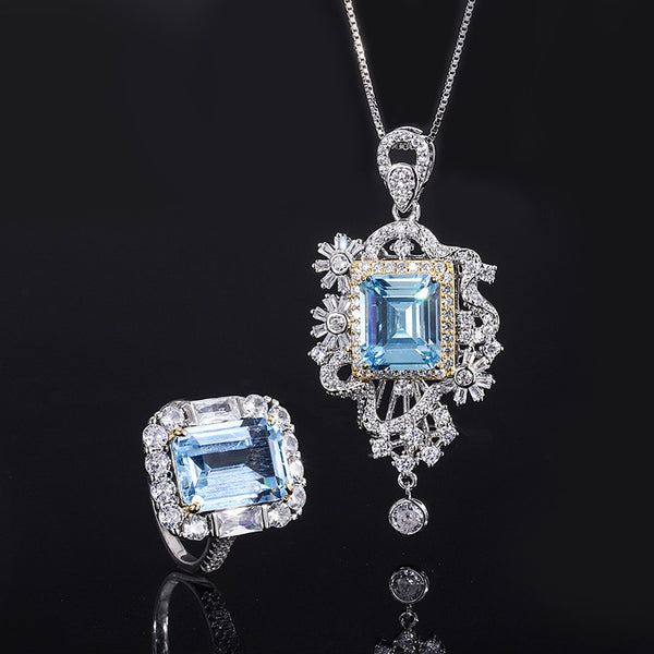 Conjunto de Anillo y Pendiente de Aguamarina Simulada
