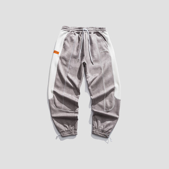 Pantalones Deportivos Hong Kong con Costuras Contrastadas y Tiras Ajustables
