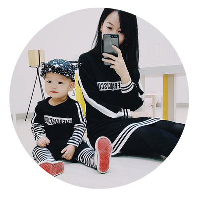 Black sweater suit with white stripes on sleeves and hem, featuring mirrored "SAN FRANCISCO" text on the chest. - Image 3