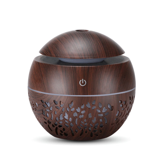 Dark wood grain mini ultrasonic humidifier with a mushroom shape and decorative hollow-out pattern. - Image 8