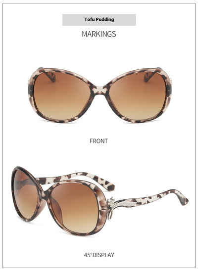 Brown oversized butterfly sunglasses with gradient lenses and a silver-tone floral accent on the temple. - Image 23