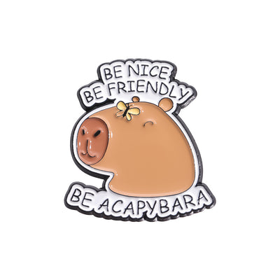 Cute capybara enamel brooch wearing a pink donut with sprinkles and "DONUT WORRY BE CAPPY" text. - Image 25