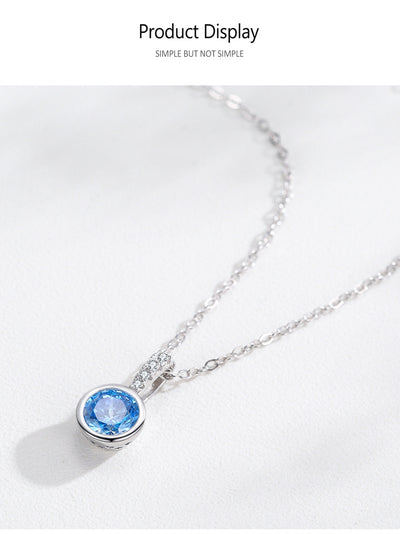 Women's light luxury jewelry set with a silver-toned necklace and hoop earrings, each featuring a sea blue artificial diamond pendant and clear artificial diamo - Image 13