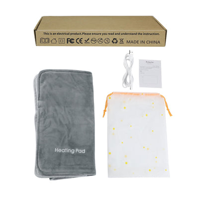 Gray USB electric heating pad, white USB cable, instruction manual, and daisy-patterned storage bag. - Image 5
